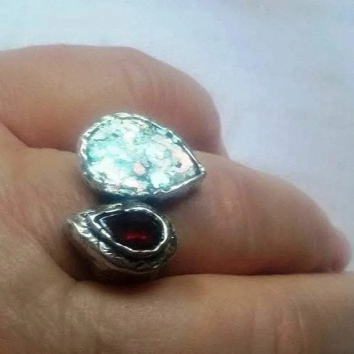 Choose this amazing Sterling silver ring with Roman Glass and a faceted garnet.