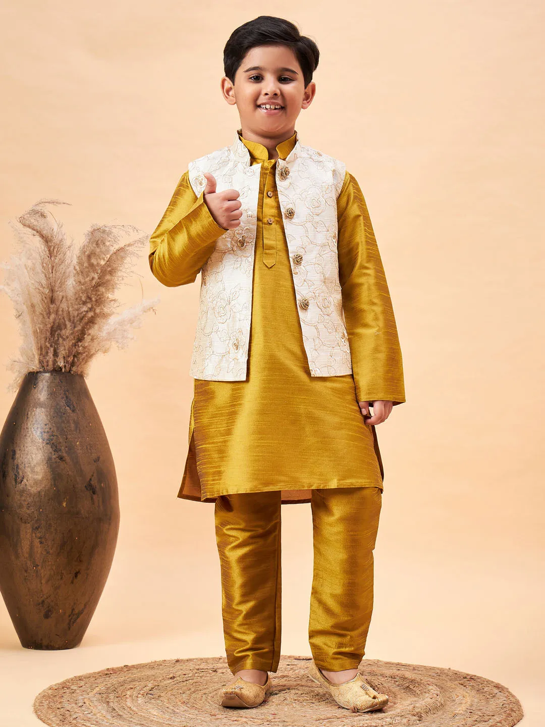 Vastramay Boy's Beige Nehru Jacket With Mustard Kurta And Pyjama Set